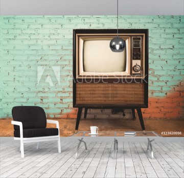 Bild på Retro old television in vintage wall pastel color background